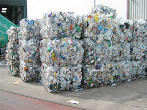 Mixed plastic bottles baled and ready for recycling
